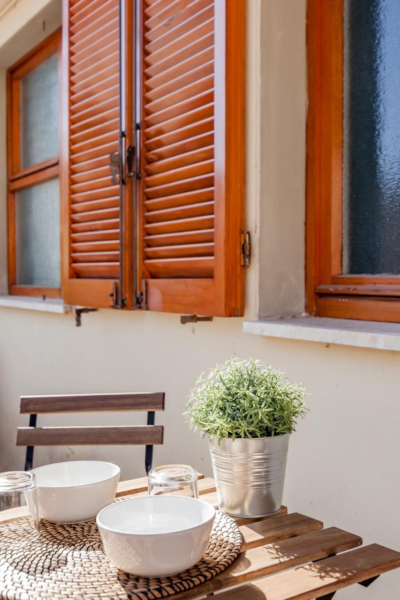 Open The Classic Wooden Shutters At A Cozy Nest Firenze